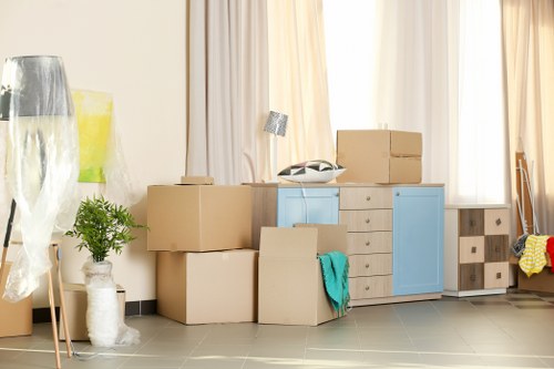 Professional packers organizing items in Storage Hammersmith