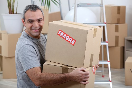 Professional removalists handling household items
