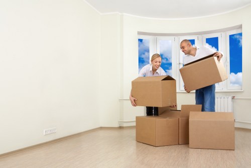 Professional movers loading a truck in Hammersmith
