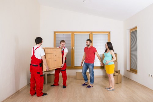 Experienced furniture pick-up professionals at work